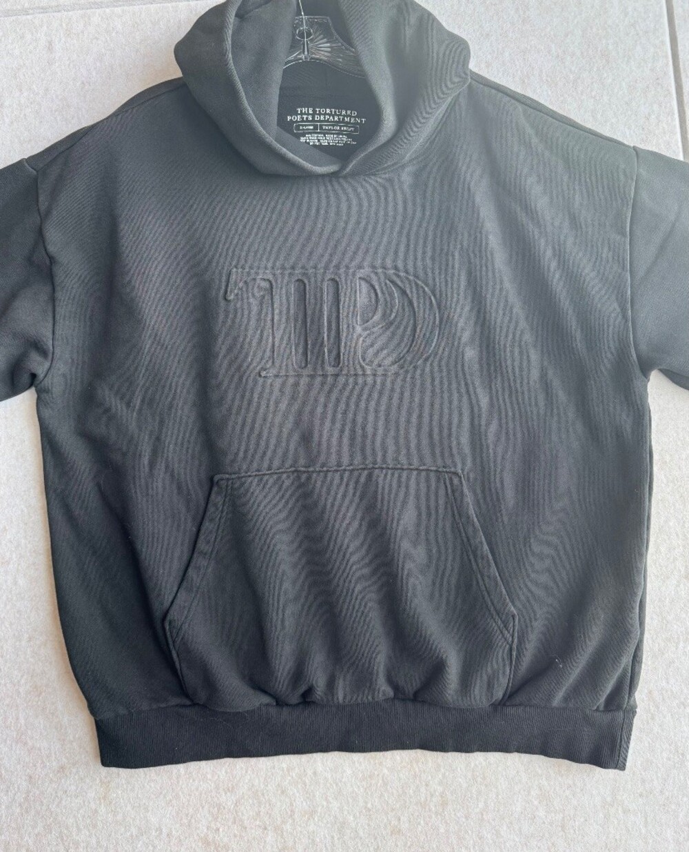 Official Taylor Swift The Tortured Poets Department TTPD Black Embossed Hoodie.